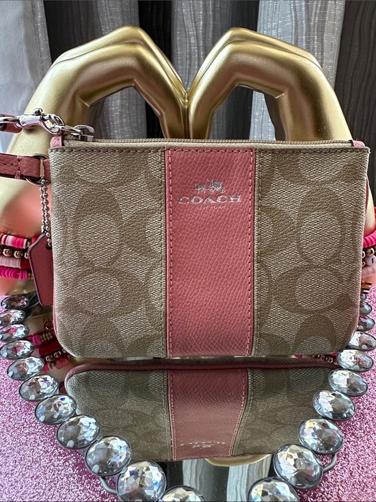 Coach Handbags - Coach Pink Center-Stripe Signature Canvas Wristlet